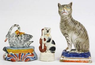 Appraisal: lot of English Staffordshire figural groups consisting of two cats