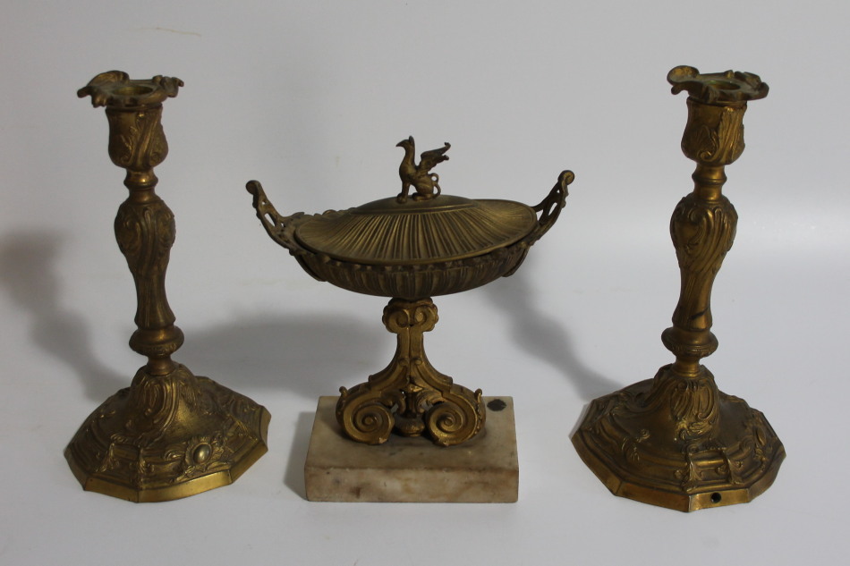 Appraisal: A pair of thC French rococo gilt brass candlesticks and