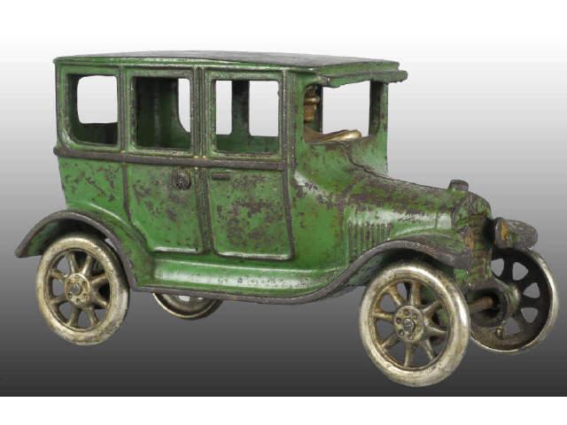 Appraisal: Cast Iron Arcade Model T Auto Description Four door sedan