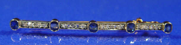 Appraisal: Edwardian unmarked white gold diamond and sapphire bar brooch