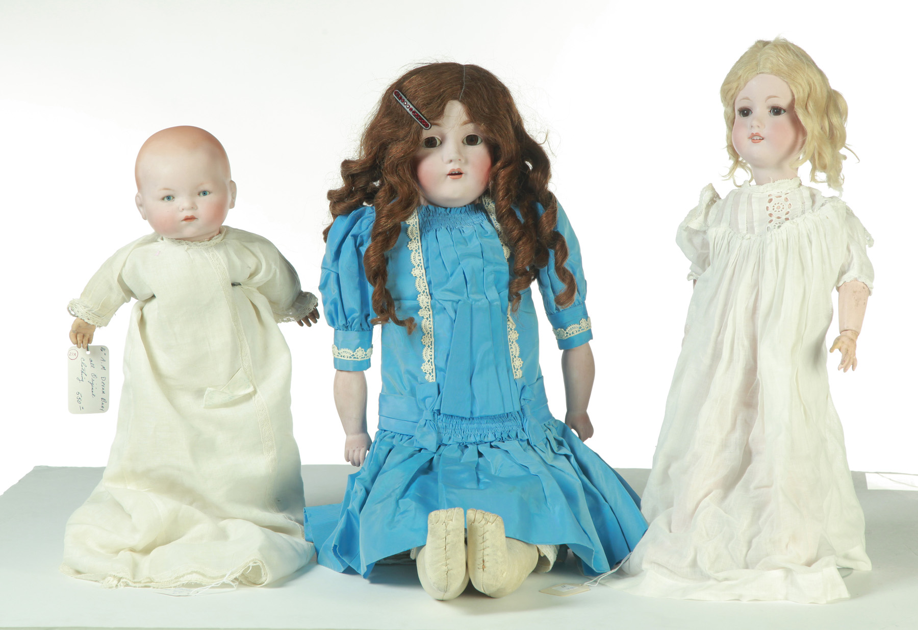 Appraisal: THREE DOLLS First half- th century Dream baby h and