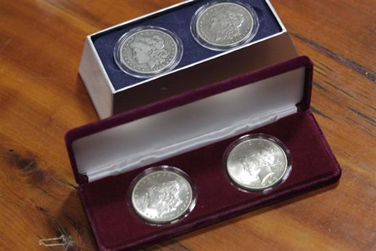 Appraisal: FOUR SILVER DOLLARS Includes two New Orleans mint Morgan dollars