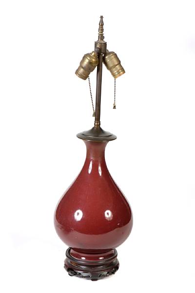 Appraisal: A red glazed Chinese jar now mounted as a lamp