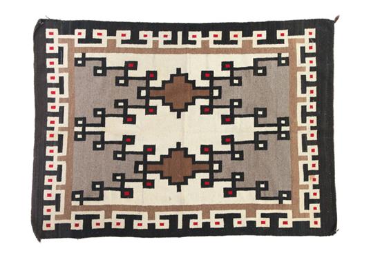 Appraisal: WEAVING Navajo th century wool Stepped designs on a natural