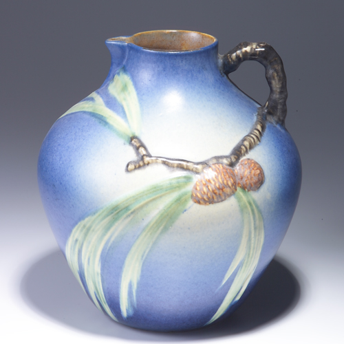 Appraisal: ROSEVILLE Blue Pine Cone bulbous pitcher Minor glaze scaling around