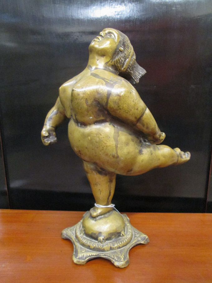 Appraisal: BRONZE FIGURAL SCULPTURE depicting a full-figured nude female on octagonal