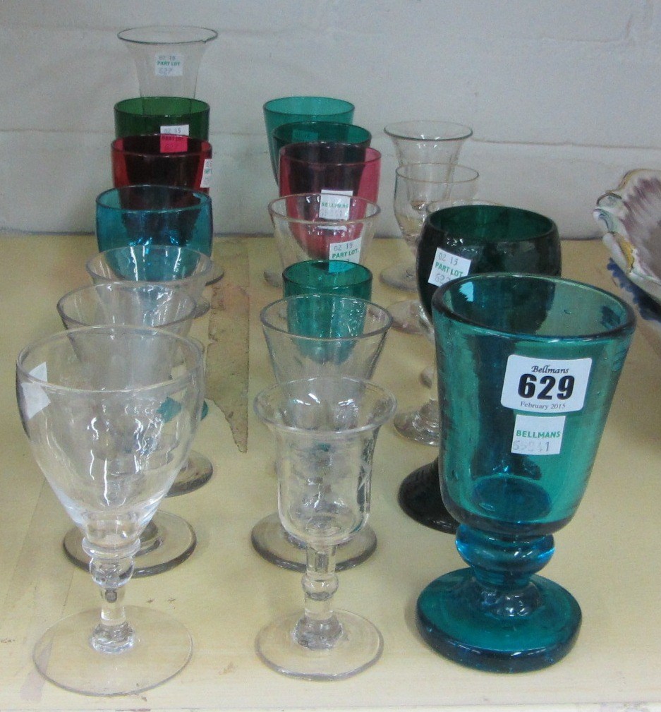 Appraisal: A group of coloured and clear glass drinking glasses th