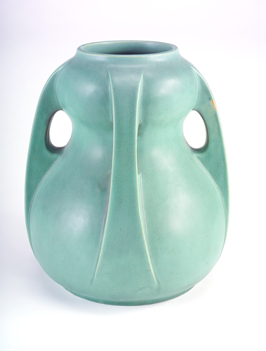 Appraisal: TECO Exceptional double-gourd vase with four buttressed handles covered in