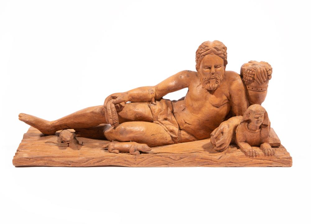 Appraisal: Carved Wood Figure of Reclining Man modeled amongst an urn