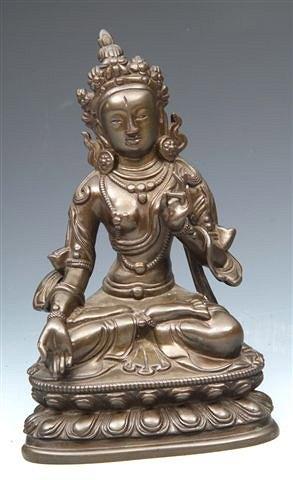 Appraisal: A FAR EASTERN BRONZE FIGURE OF AVALOKITISVARA seated on a