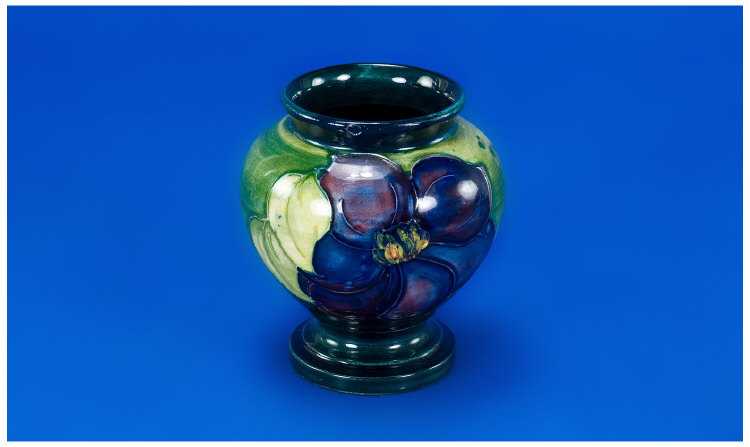 Appraisal: Moorcroft Urn Vase Clematis Pattern on a blue green ground