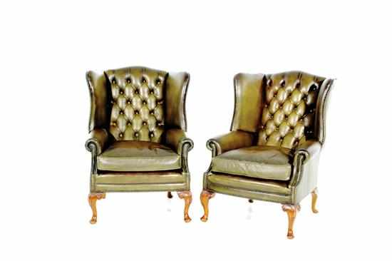 Appraisal: Pair Queen Anne style leather wingback armchairs th century tufted