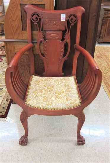 Appraisal: LATE VICTORIAN CARVED AND INLAID ARMCHAIR American c cherry finish