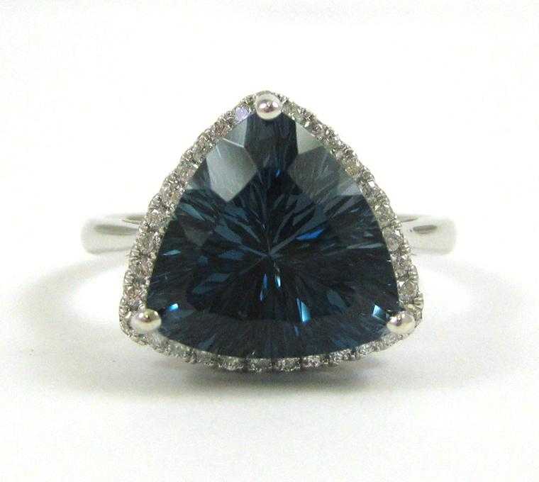 Appraisal: BLUE TOPAZ DIAMOND AND WHITE GOLD RING The k white