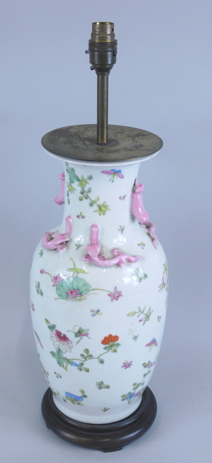 Appraisal: A modern Chinese porcelain lamp base decorated with peaches flowers