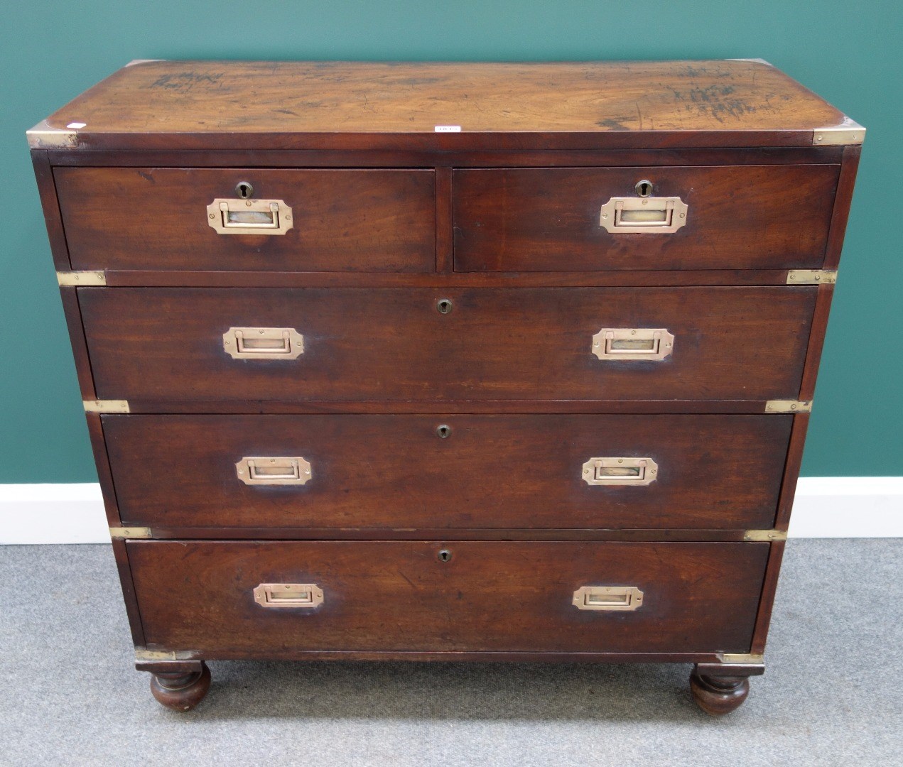 Appraisal: A th century campaign style mahogany chest of two short