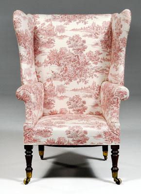 Appraisal: Regency mahogany wing chair rolled arms and turned legs on