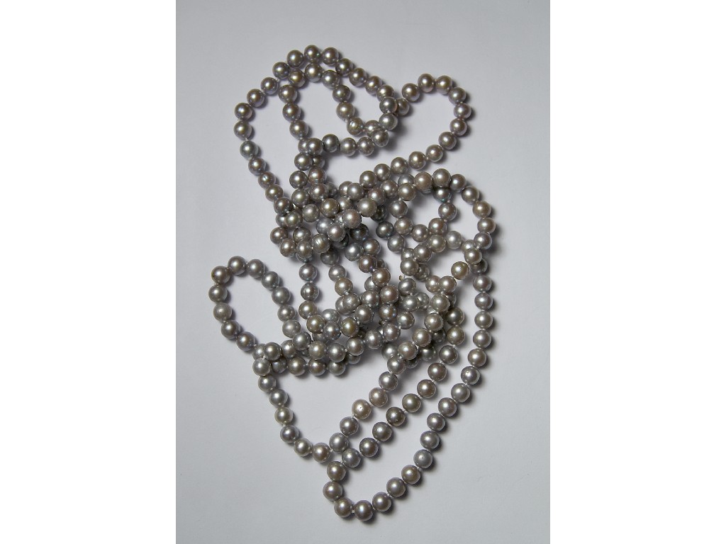 Appraisal: Opera length pale grey uniform freshwater pearl necklace