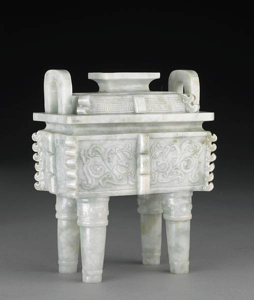 Appraisal: A mottled jadeite archaistic covered ritual vessel th Century In