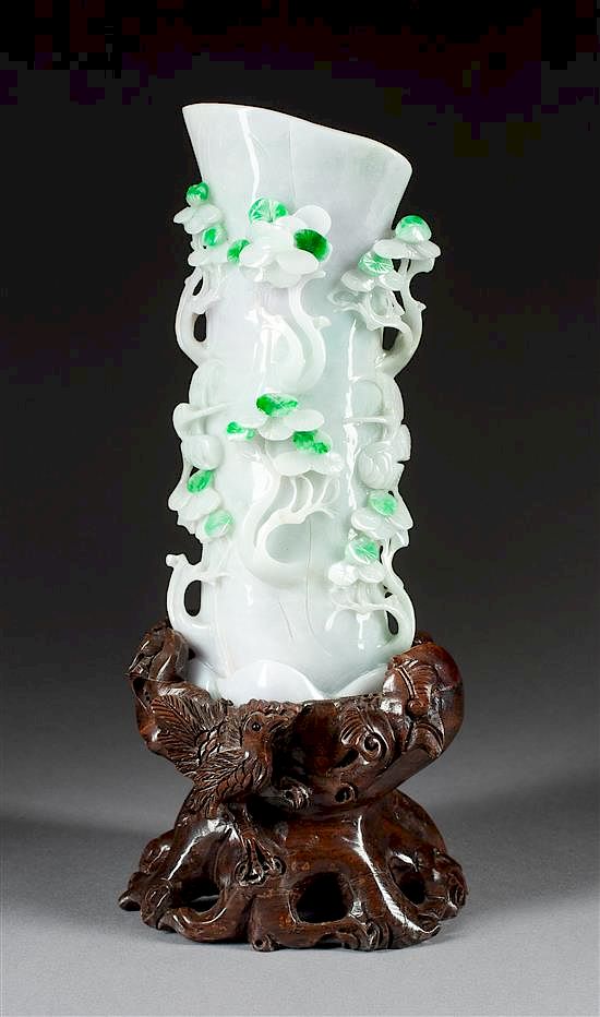 Appraisal: A Chinese Carved Jadeite Vase Height of vase x width