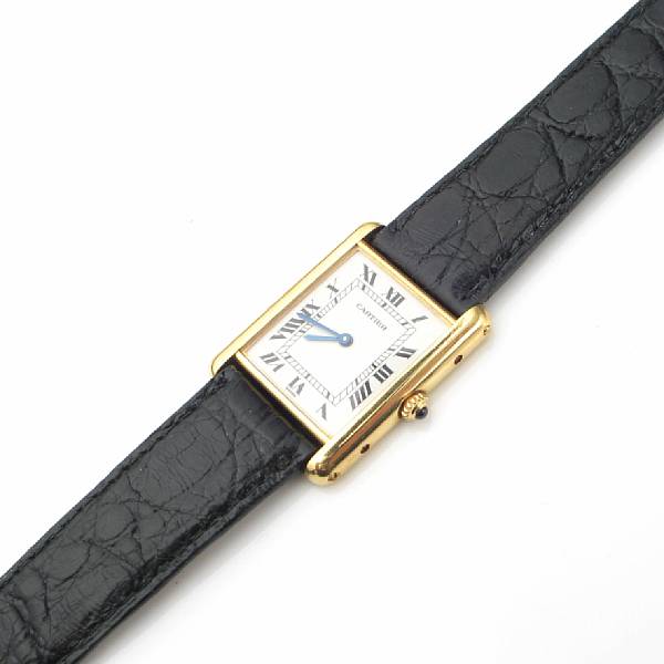 Appraisal: A gent's k gold tank wristwatch Cartier quartz movement with