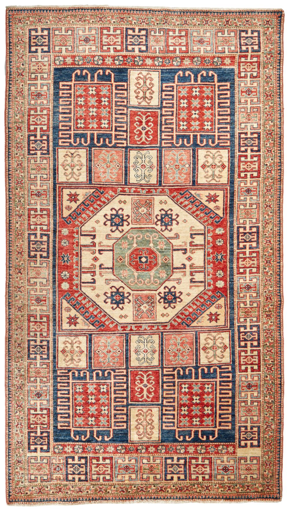 Appraisal: A Pakistani Kazak-style area rug Fourth-Quarter th Century or Later