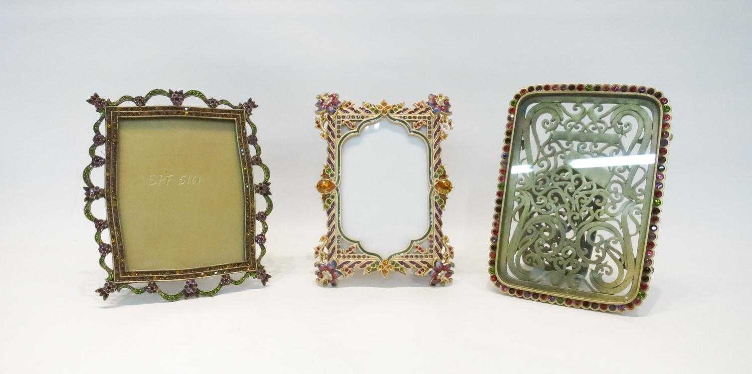 Appraisal: THREE JAY STRONGWATER PICTURE FRAMES of cast metal and adorned