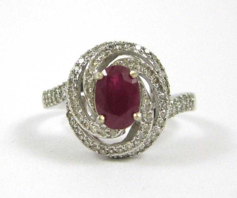 Appraisal: RUBY DIAMOND AND FOURTEEN KARAT GOLD RING The white gold