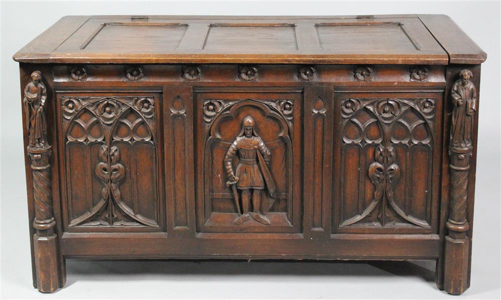 Appraisal: GOTHIC STYLE OAK BLANKET CHEST carved with reserves depicting soldiers