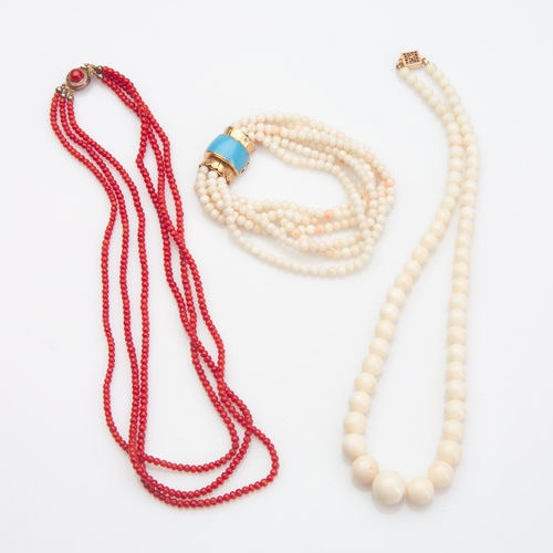 Appraisal: 's Three pieces triple strand necklace of coral beads mm