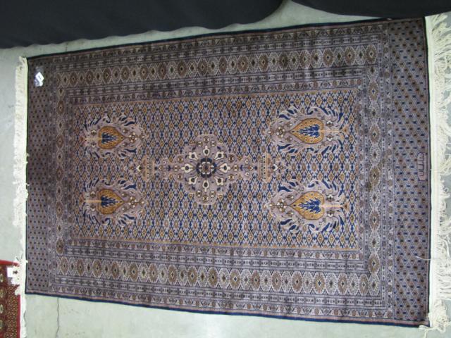 Appraisal: Vintage Persian area rug ' x ' with weaver signature