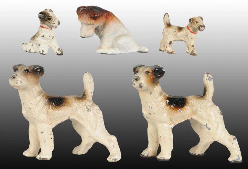 Appraisal: Lot of Wirehaired Terrier Dog Cast Iron Paperwei Description One