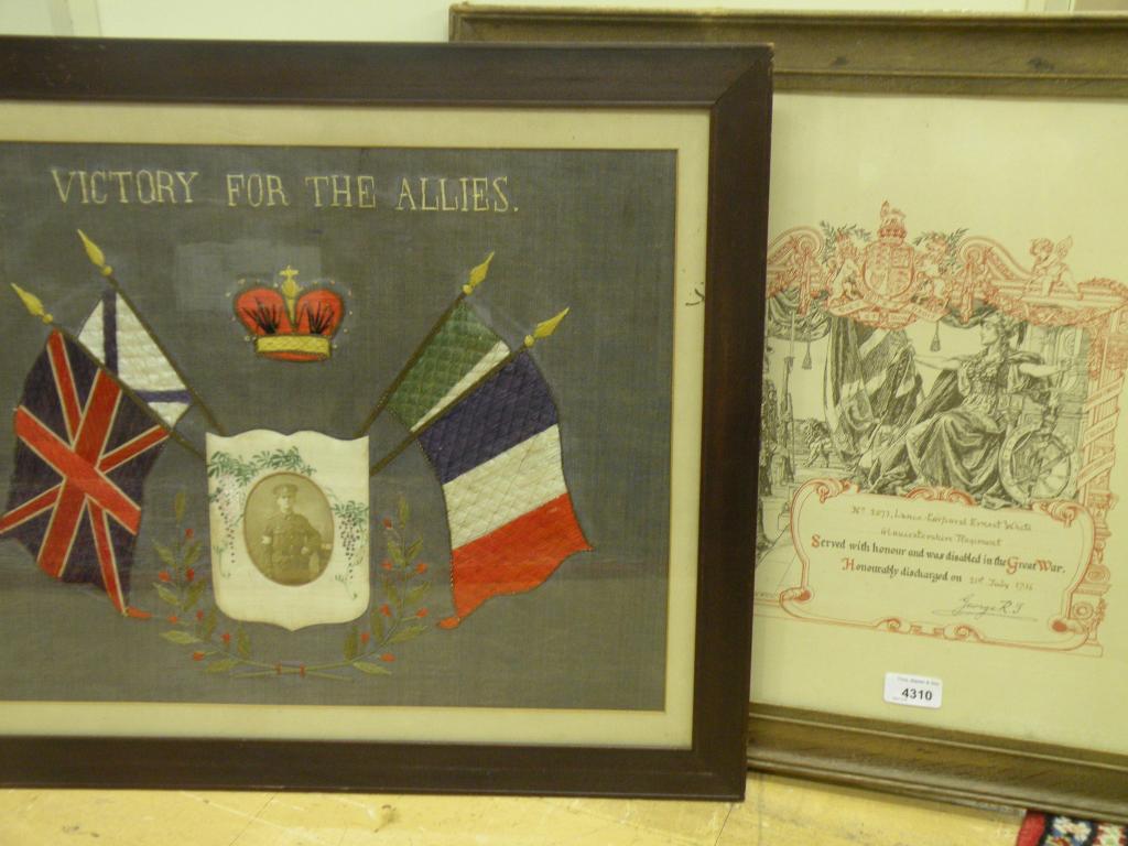 Appraisal: A framed certificate of Honourable Discharge for Lcpl Ernest White