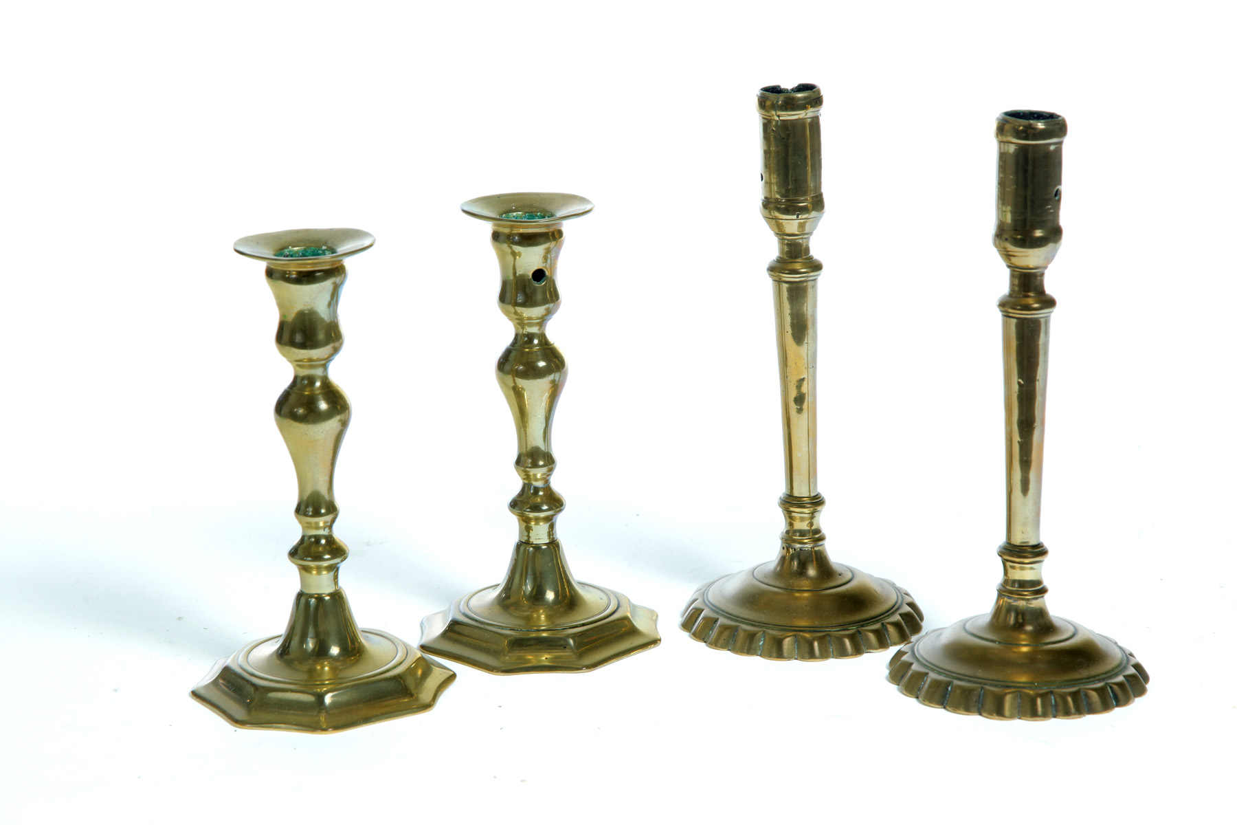 Appraisal: TWO PAIR OF EUROPEAN BRASS CANDLESTICKS Eighteenth- th century Octagonal