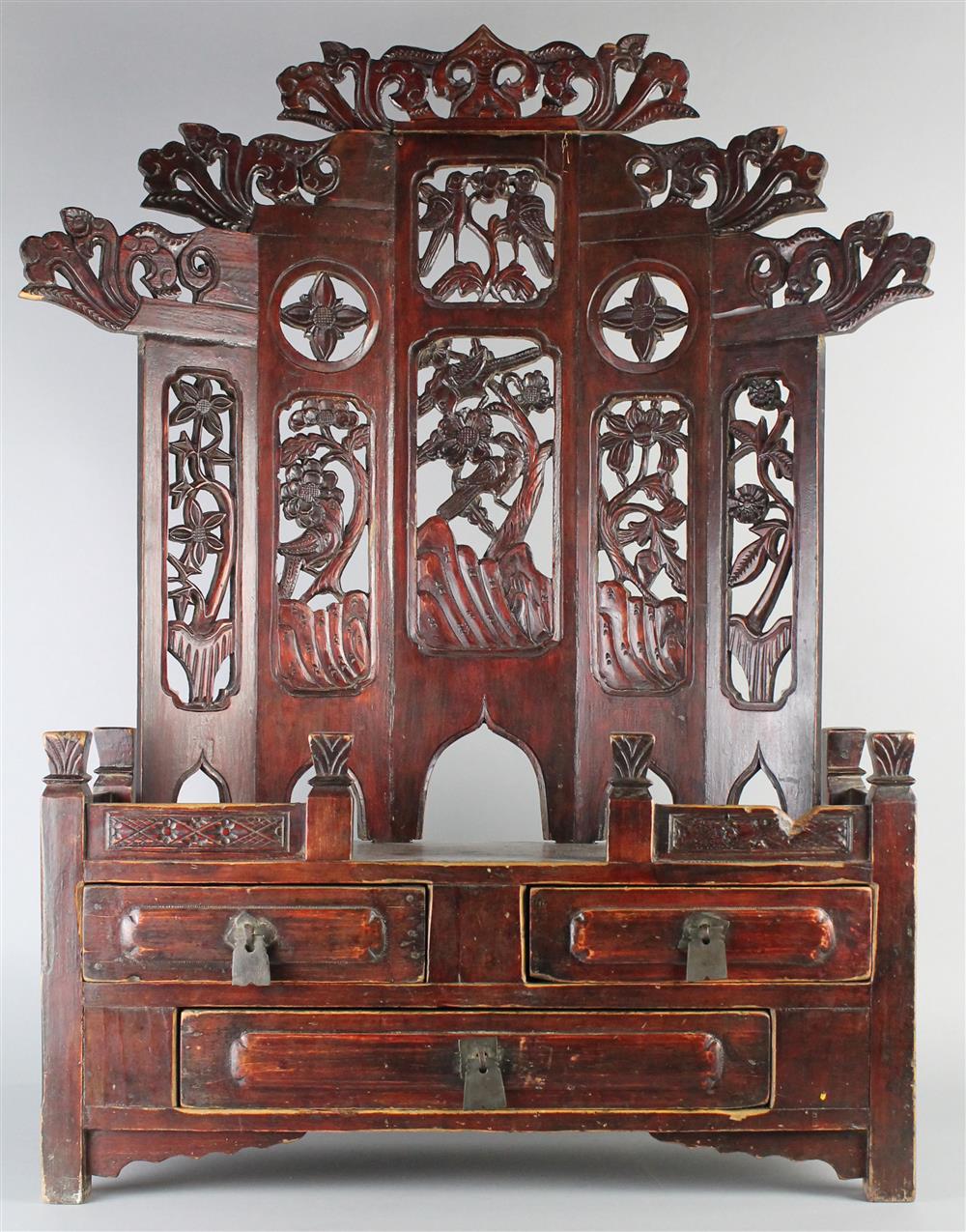 Appraisal: NORTHERN CHINESE TABLETOP SHRINE CABINET carved with three long drawers