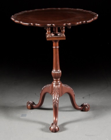 Appraisal: Chippendale style mahogany tilt-top table th century pie-crust top with