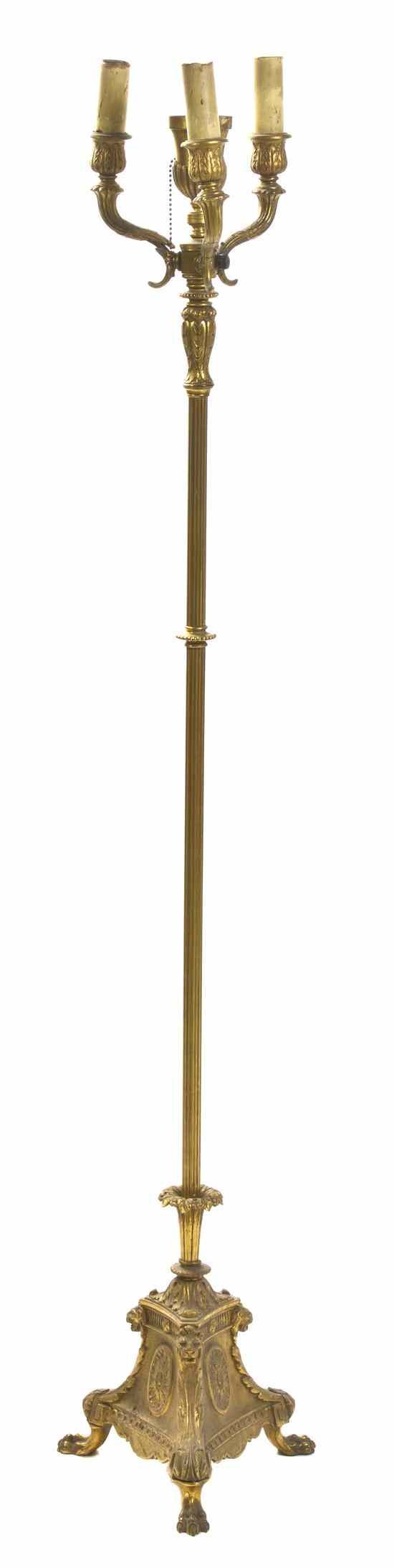 Appraisal: A Neoclassical Gilt Bronze Torchiere having cornucopia form candle arms