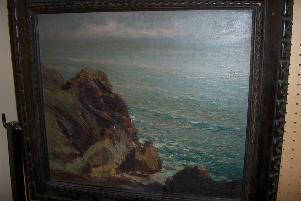 Appraisal: A continental oil painting on panel of a rocky coastal