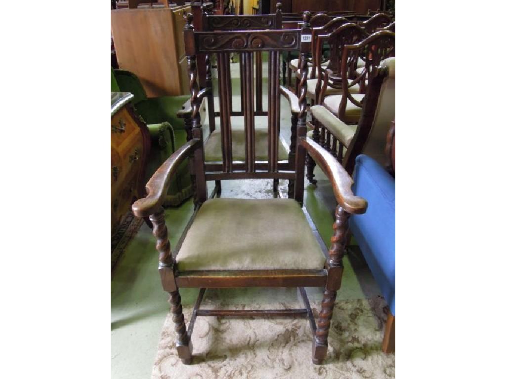 Appraisal: A pair of 's oak open elbow chairs with carved