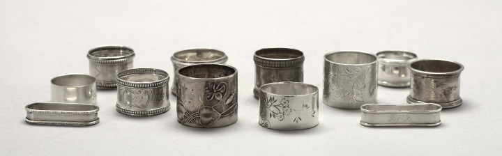 Appraisal: Interesting Twelve-Piece Collection of Sterling Coin Silver and Silverplate Napkin