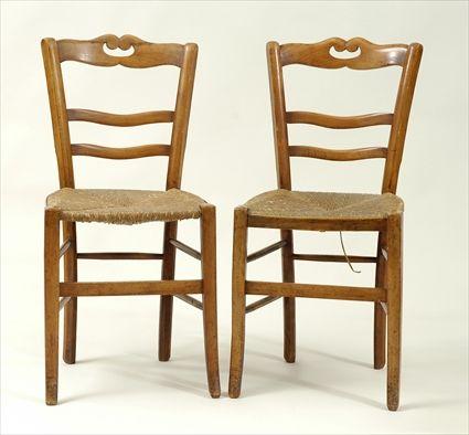 Appraisal: Pair of French Provincial Fruitwood Slat-Back Side Chairs with Rush