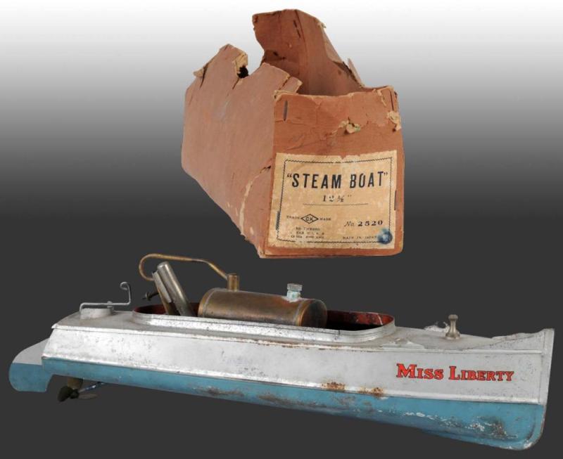 Appraisal: Miss Liberty No Steam Boat Toy Description Maufactured by C-K