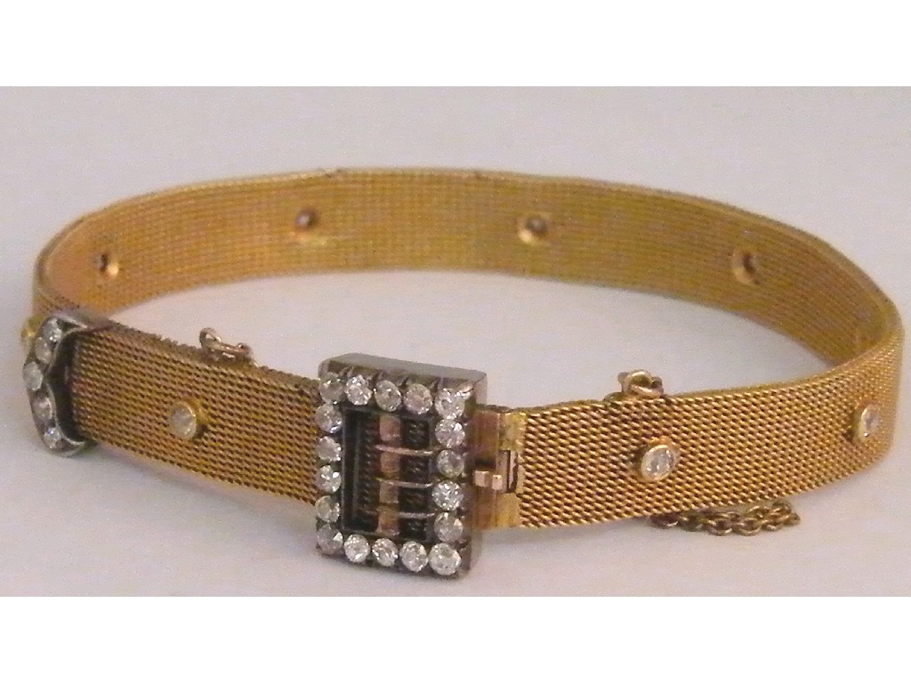 Appraisal: Attractive gold mesh diamond set bracelet with a buckle design