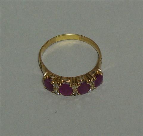 Appraisal: LADY'S GOLD RUBY AND DIAMOND RING Set in k rose