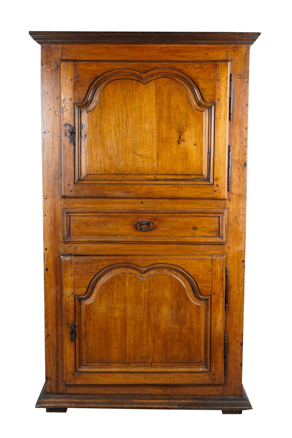 Appraisal: PROVINCIAL CARVED FRUITWOOD CABINETlate th or early th century with