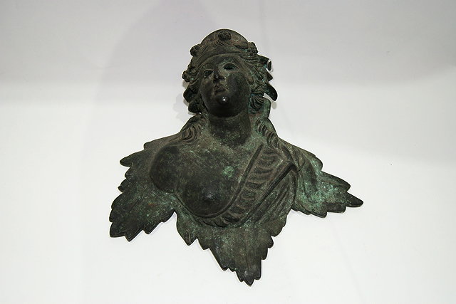 Appraisal: A VERDIGRIS BRONZE MOUNT IN THE FORM OF A BUST