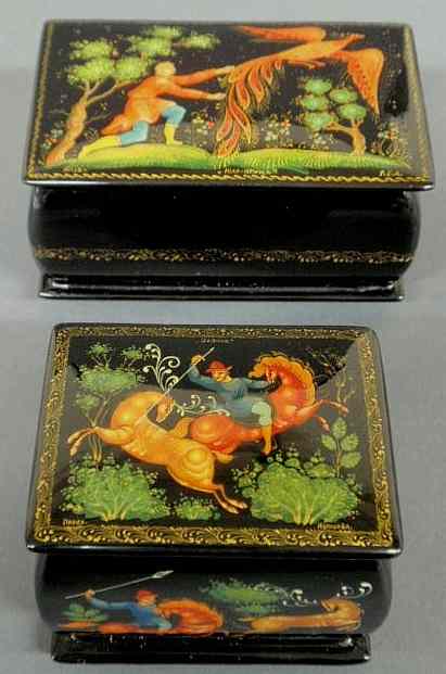 Appraisal: Two similar Russian lacquerware boxes c one decorated with a