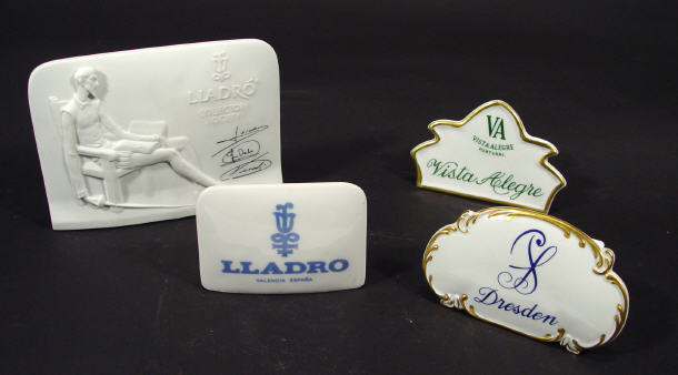 Appraisal: Two Lladro porcelain advertising signs a Dresden ceramic sign and