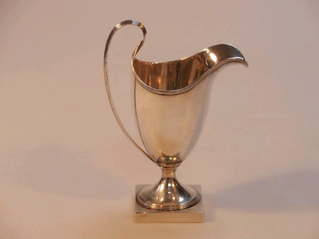 Appraisal: A George III silver helmet shape cream jug with reeded