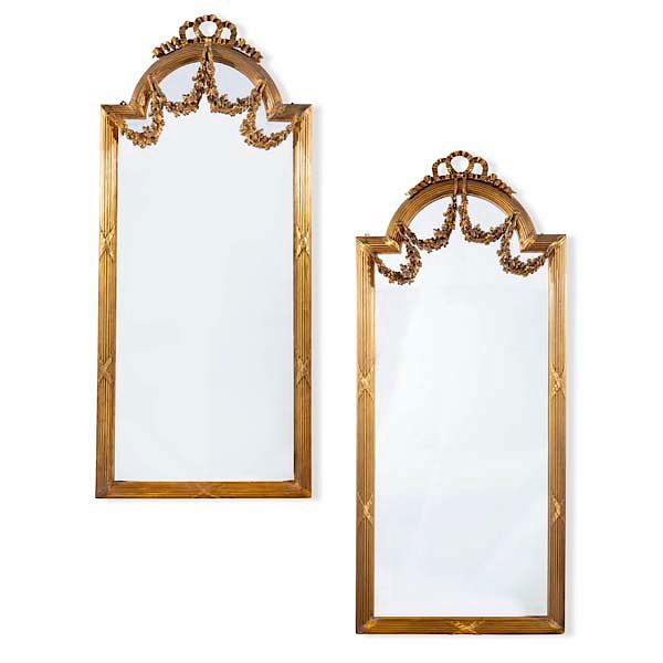 Appraisal: A pair of Louis XVI style giltwood pier mirrors A